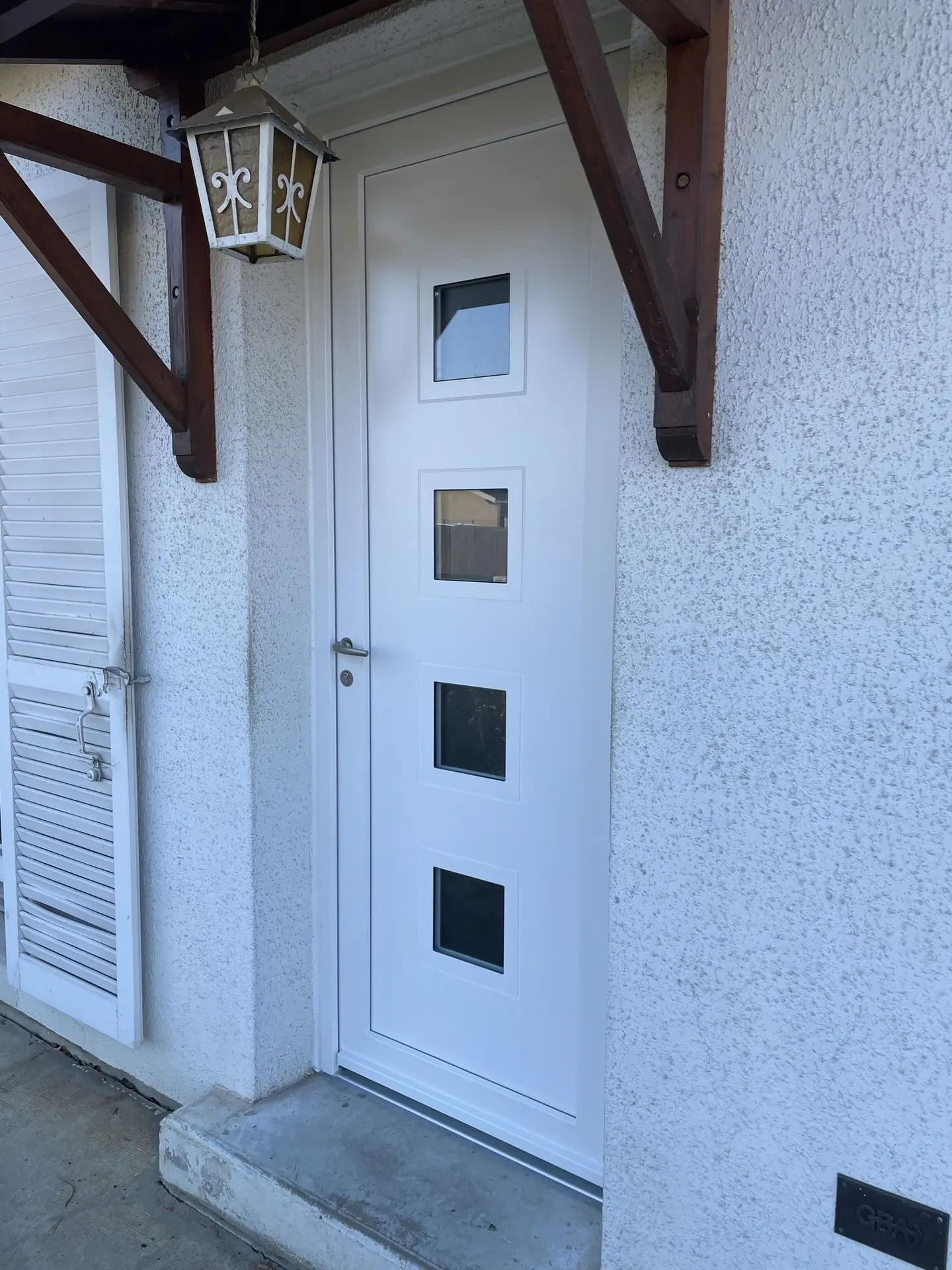 Porte d’entrée aluminium acier sécurité renforcé finition grande hauteur pivot coulissante